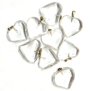 Pile of Clear Quartz Heart Pendants