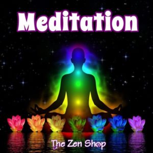 Silouettee of a person in meditation pose with chakras